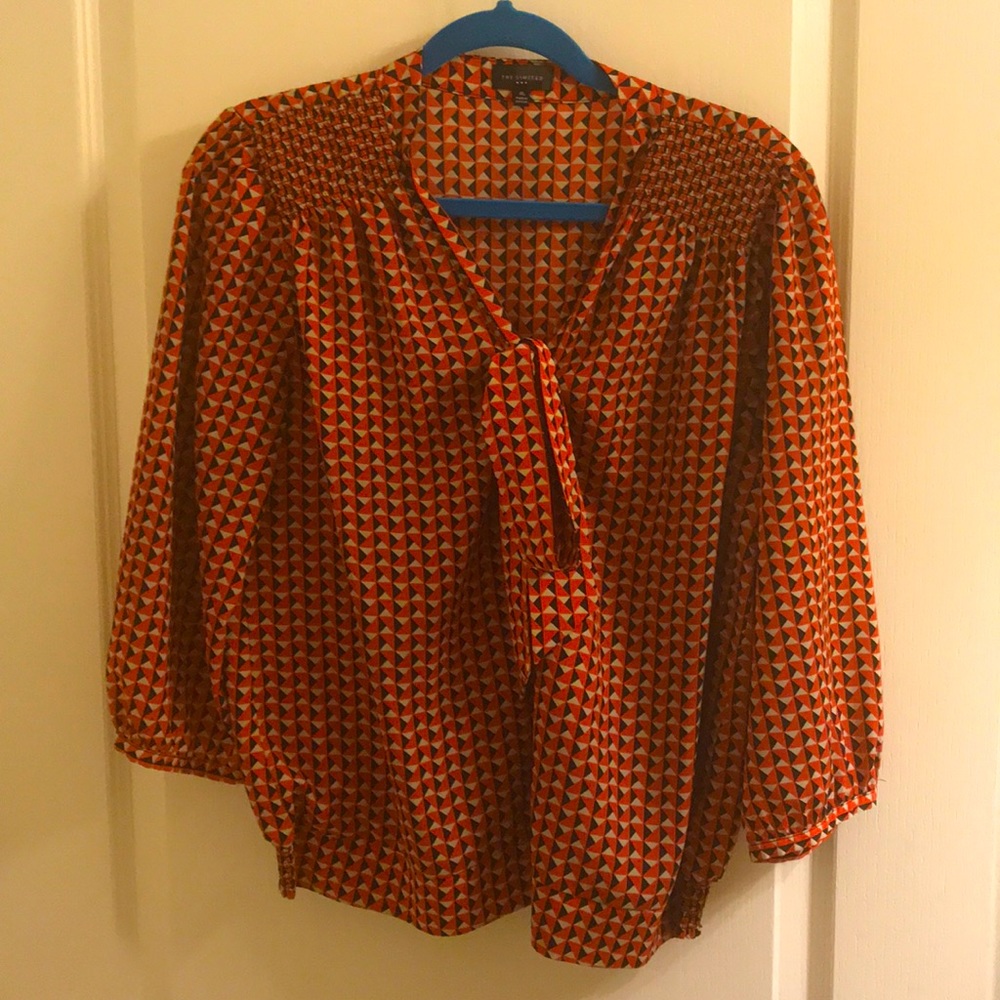 Orange and back blouse